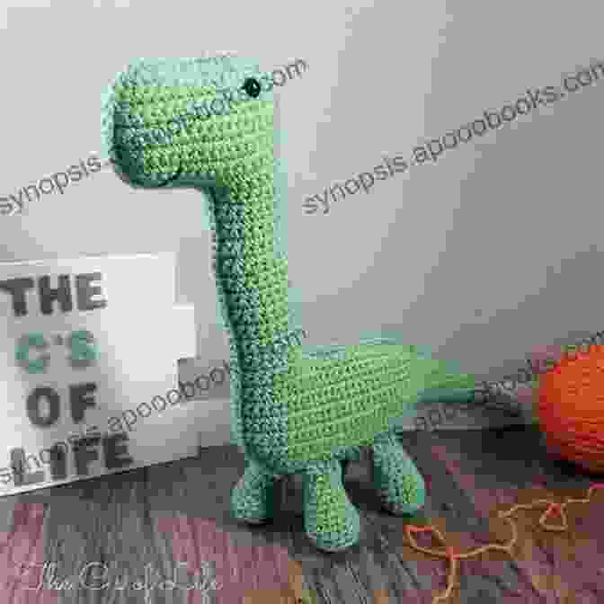 A Crocheted Brachiosaurus Hat With A Long Neck And A Peaceful Expression Into The Wild Volume 2: 10 Animal Dinosaur Monster Crochet Hat Patterns