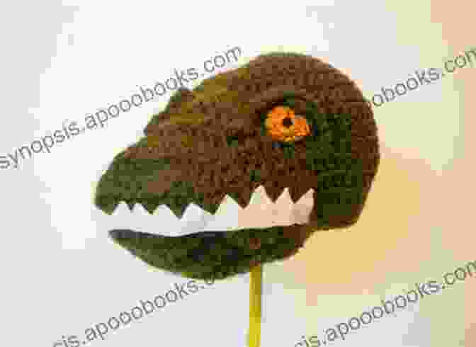 A CrochetedTyrannosaurus Rex Hat With Sharp Teeth And A Long Tail Into The Wild Volume 2: 10 Animal Dinosaur Monster Crochet Hat Patterns