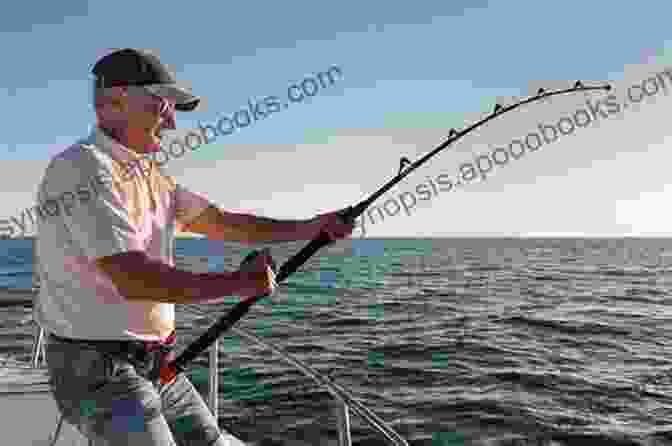 An Angler Reeling In A Large Fish On A Slappy Fishing Charter Slappy S Fishing Charter: A Story Of Love Lobstering And Sport Fishing Off The Mid Coast Of Maine