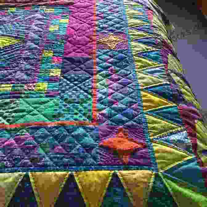 Close Up Of Intricate Hand Embroidery On A Patchwork Quilt The Essential Sampler Quilt Book: 40 Techniques For Machine And Hand Patchwork