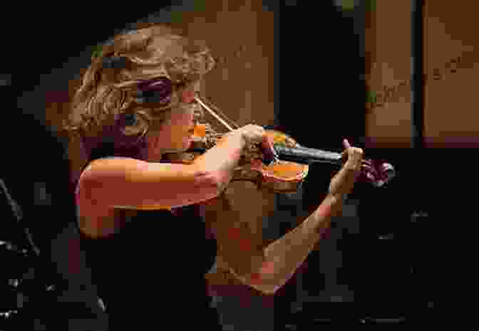 Image Of A Violinist Performing With Passion And Precision. Taylor Davis Favorites: Violin Play Along Volume 73 (Hal Leonard Violin Play Along)